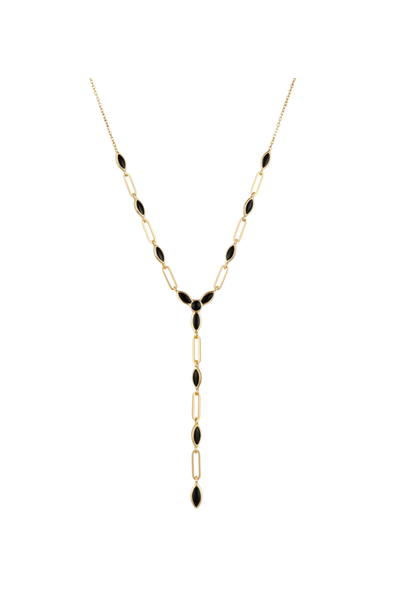 a gold necklace with black stones