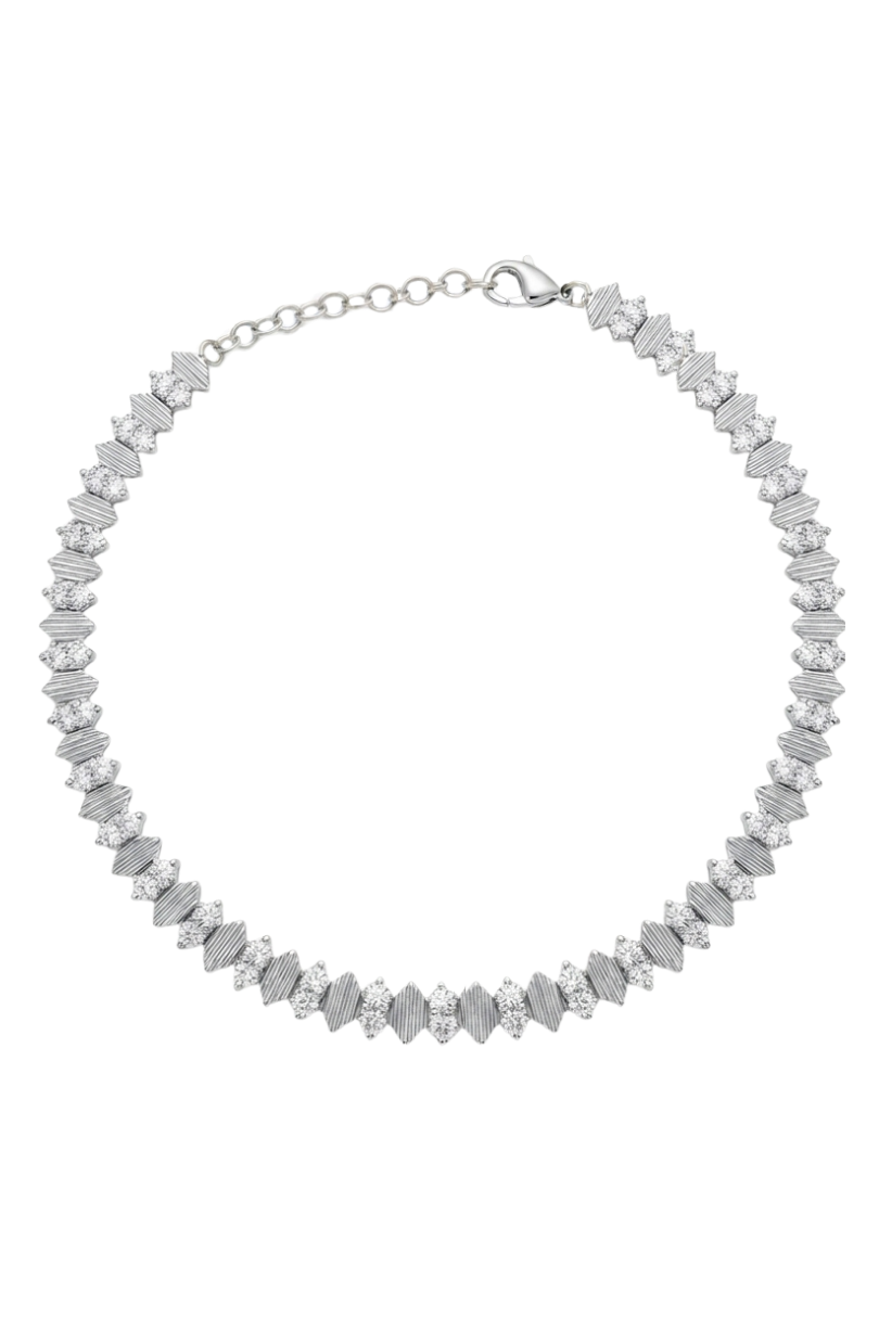 a silver necklace with diamonds