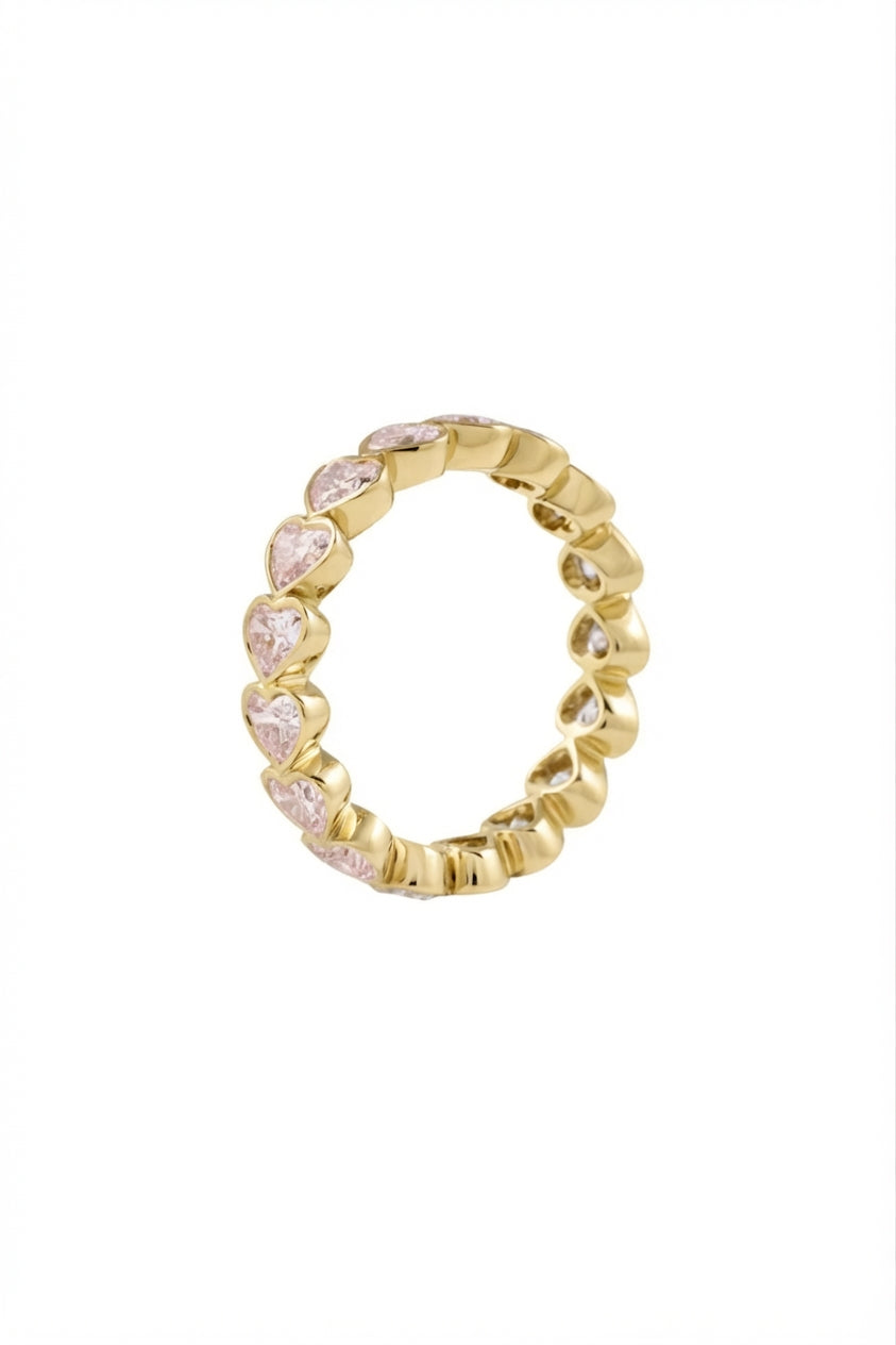 a gold ring with diamonds