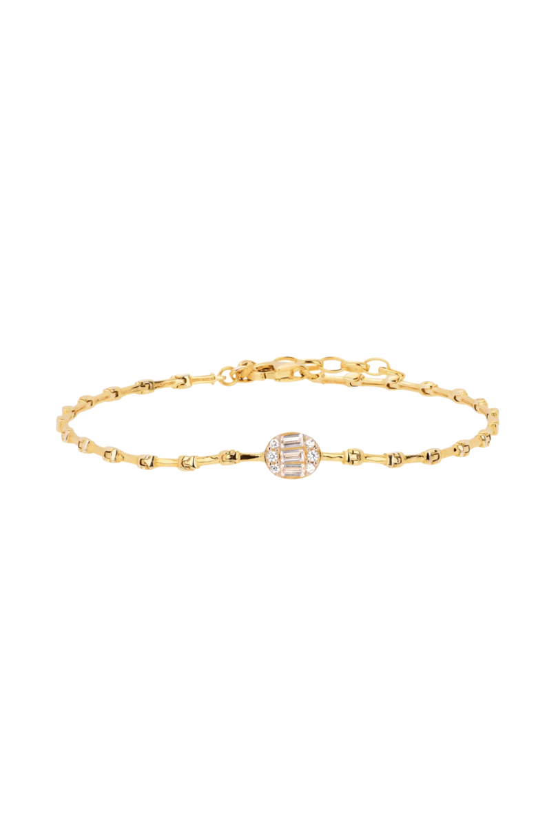 a gold bracelet with diamonds
