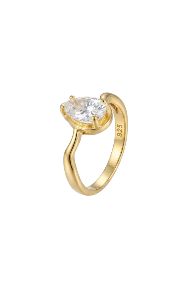 a gold ring with a large stone