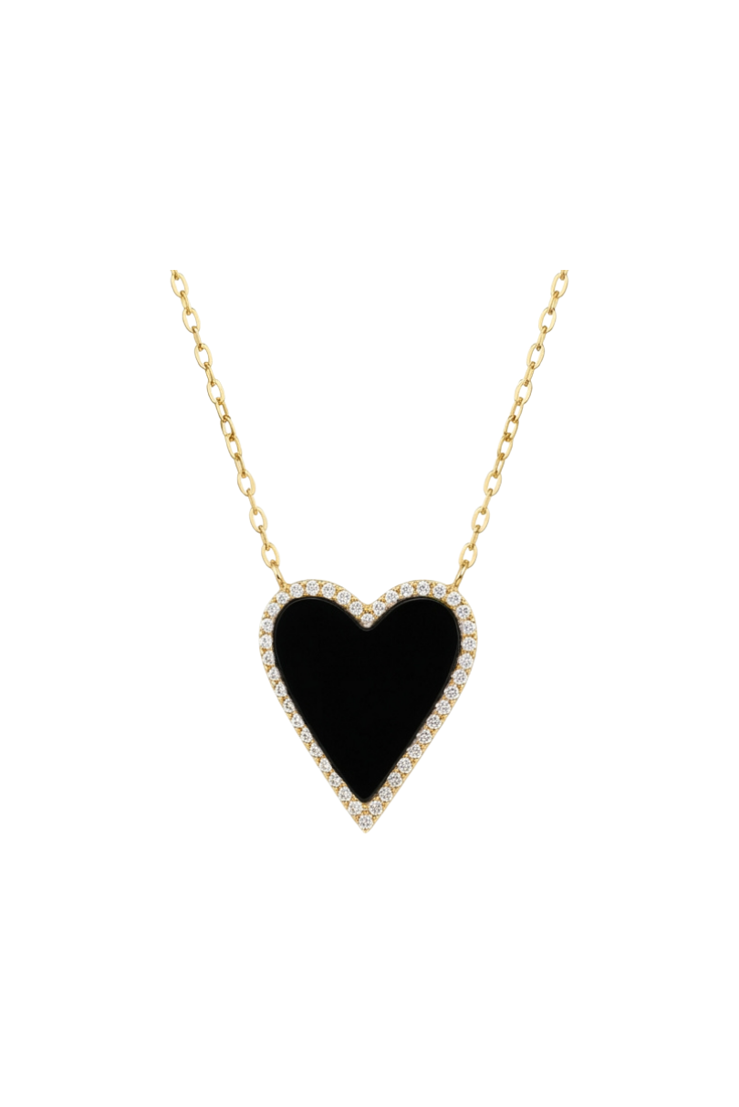 a gold chain with a black heart pendant