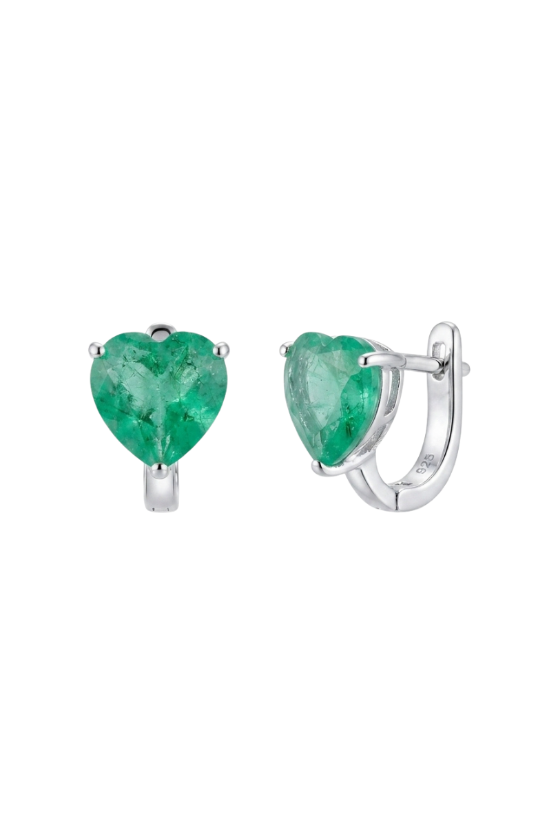 a pair of earrings with green stones