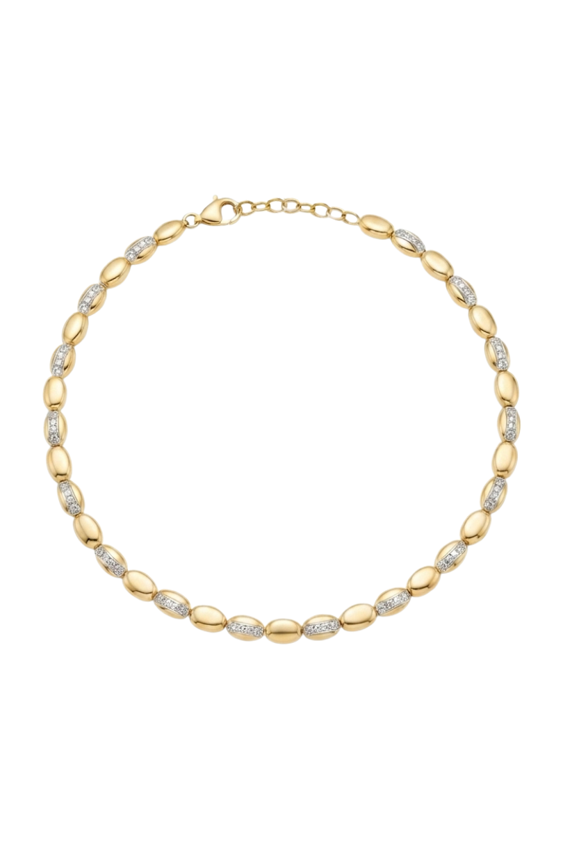 a gold necklace with diamonds