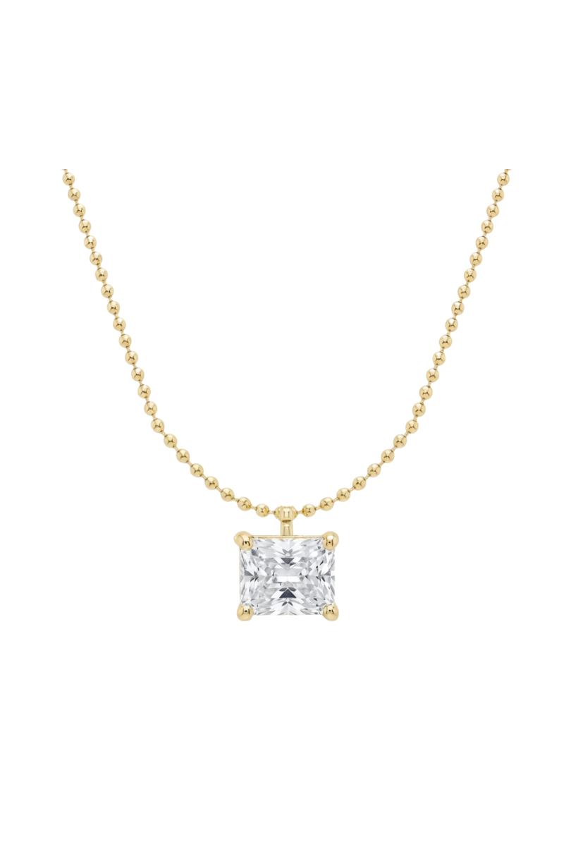 a necklace with a square diamond pendant
