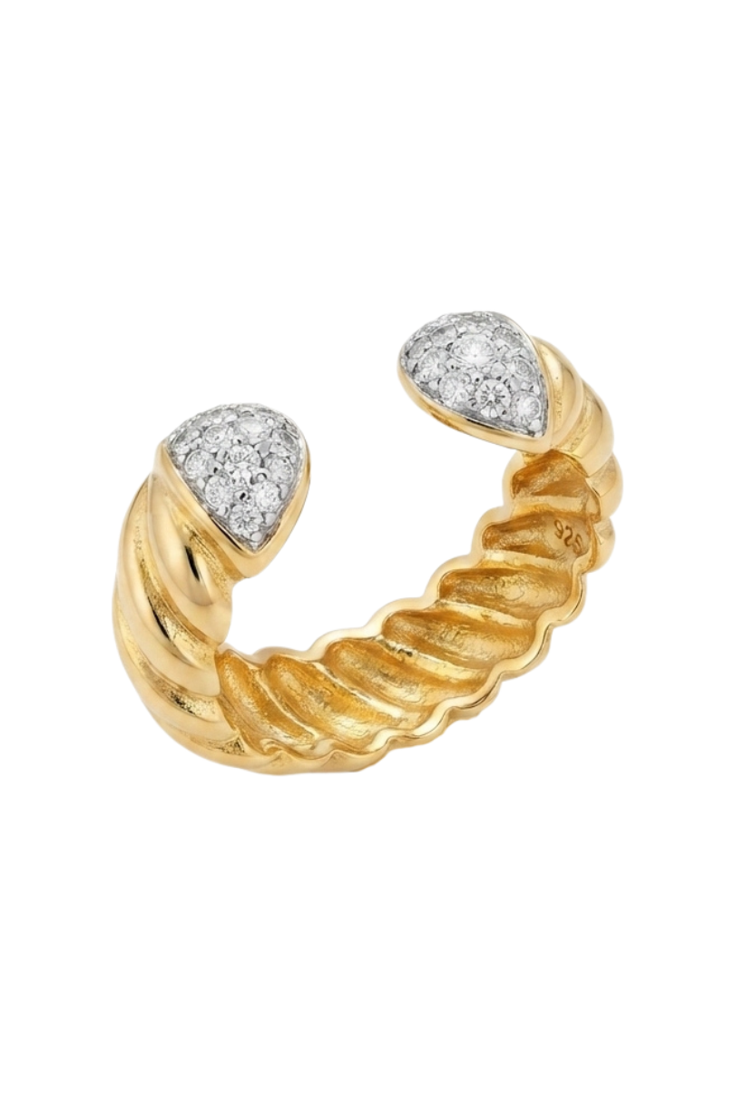 a gold ring with diamonds
