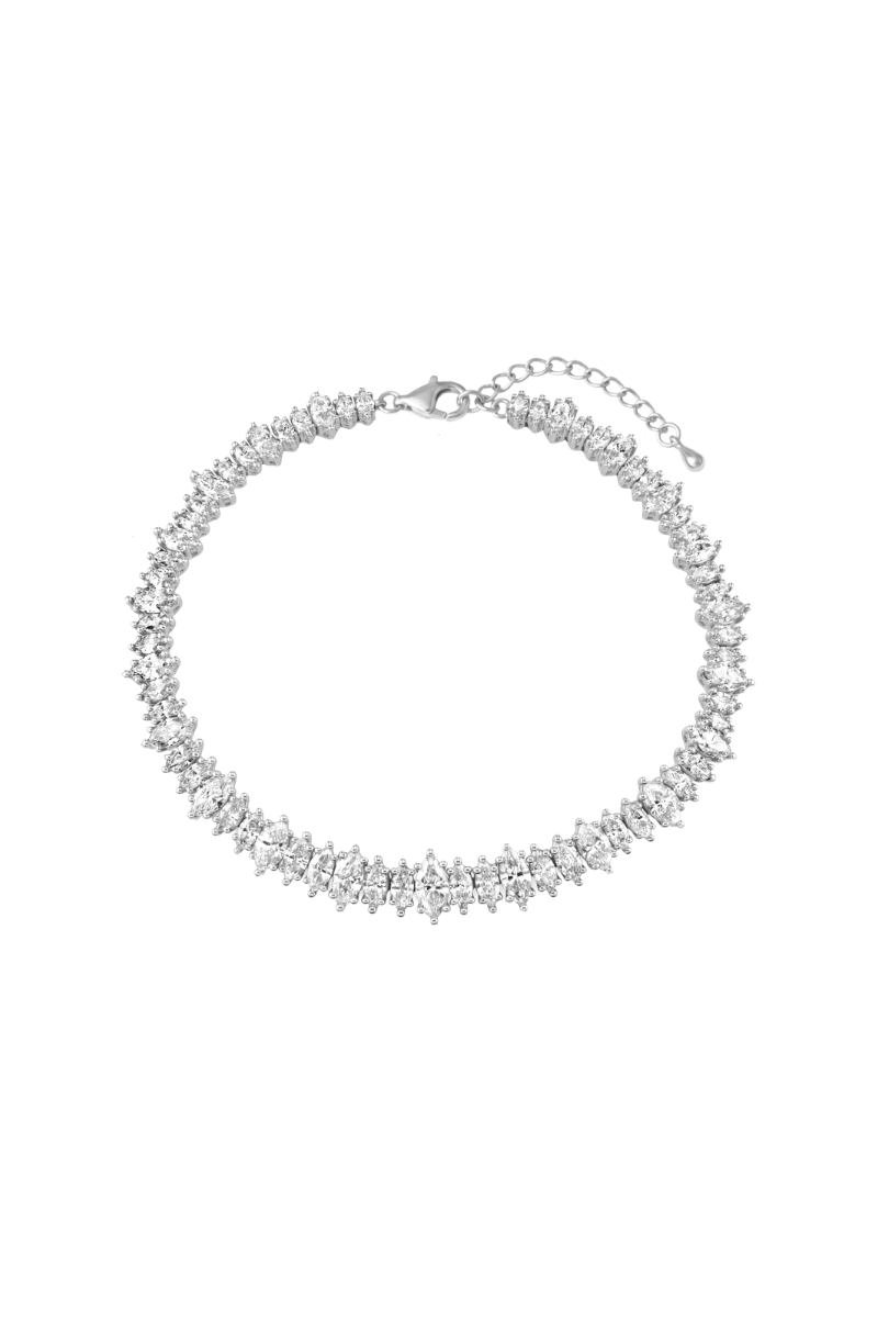 a silver bracelet with diamonds