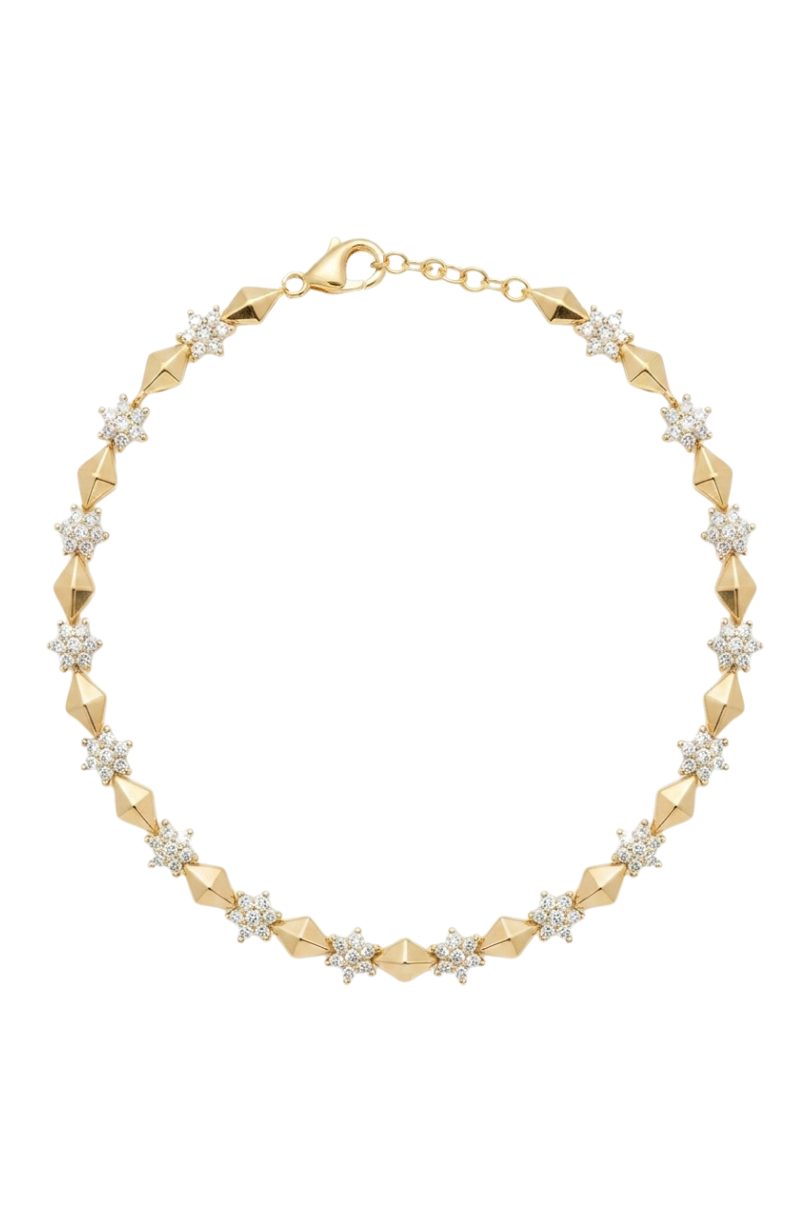 a gold bracelet with diamonds