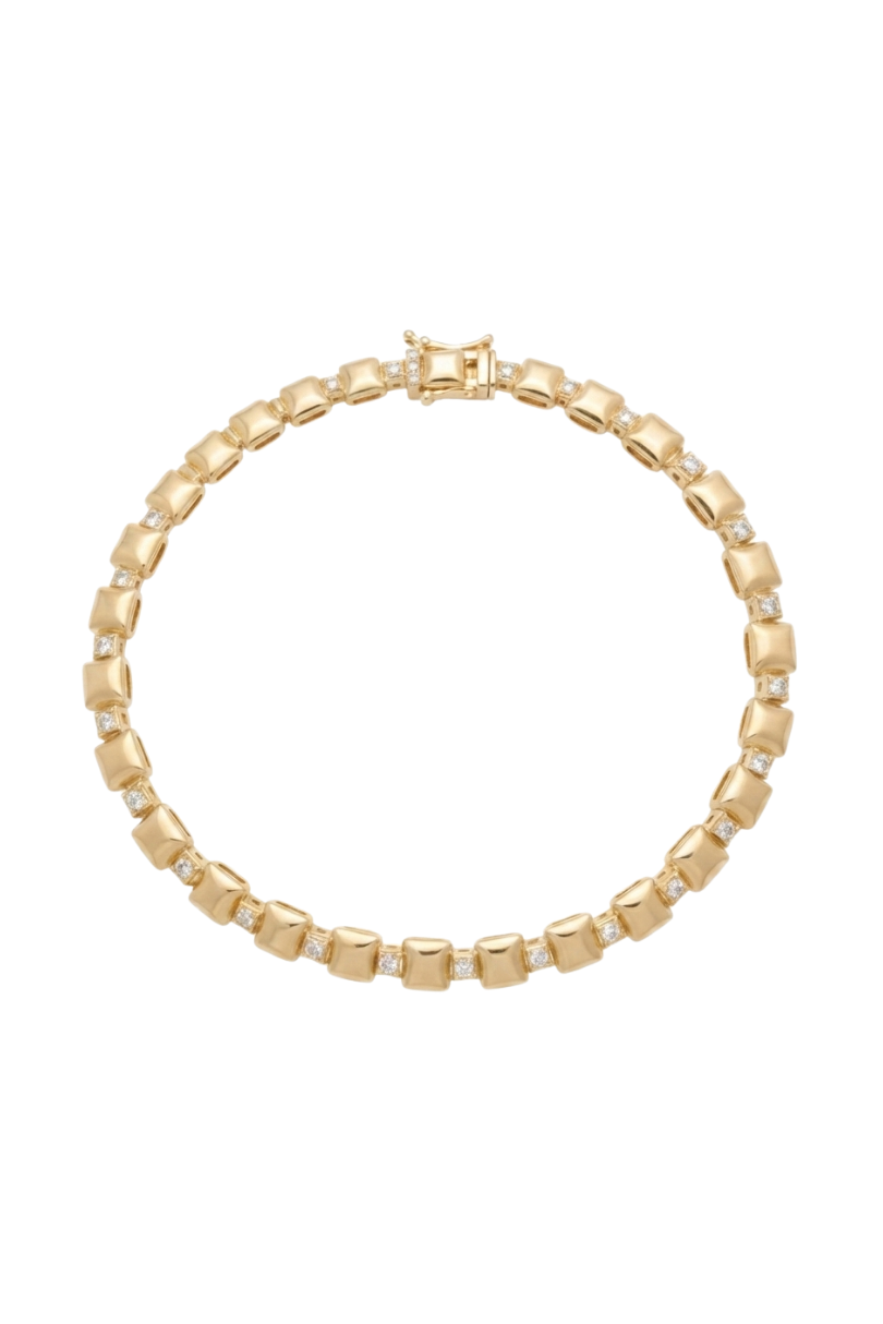 a gold bracelet with diamonds