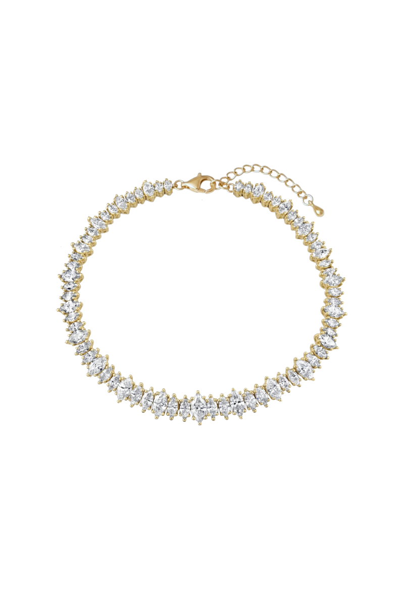 a gold bracelet with diamonds