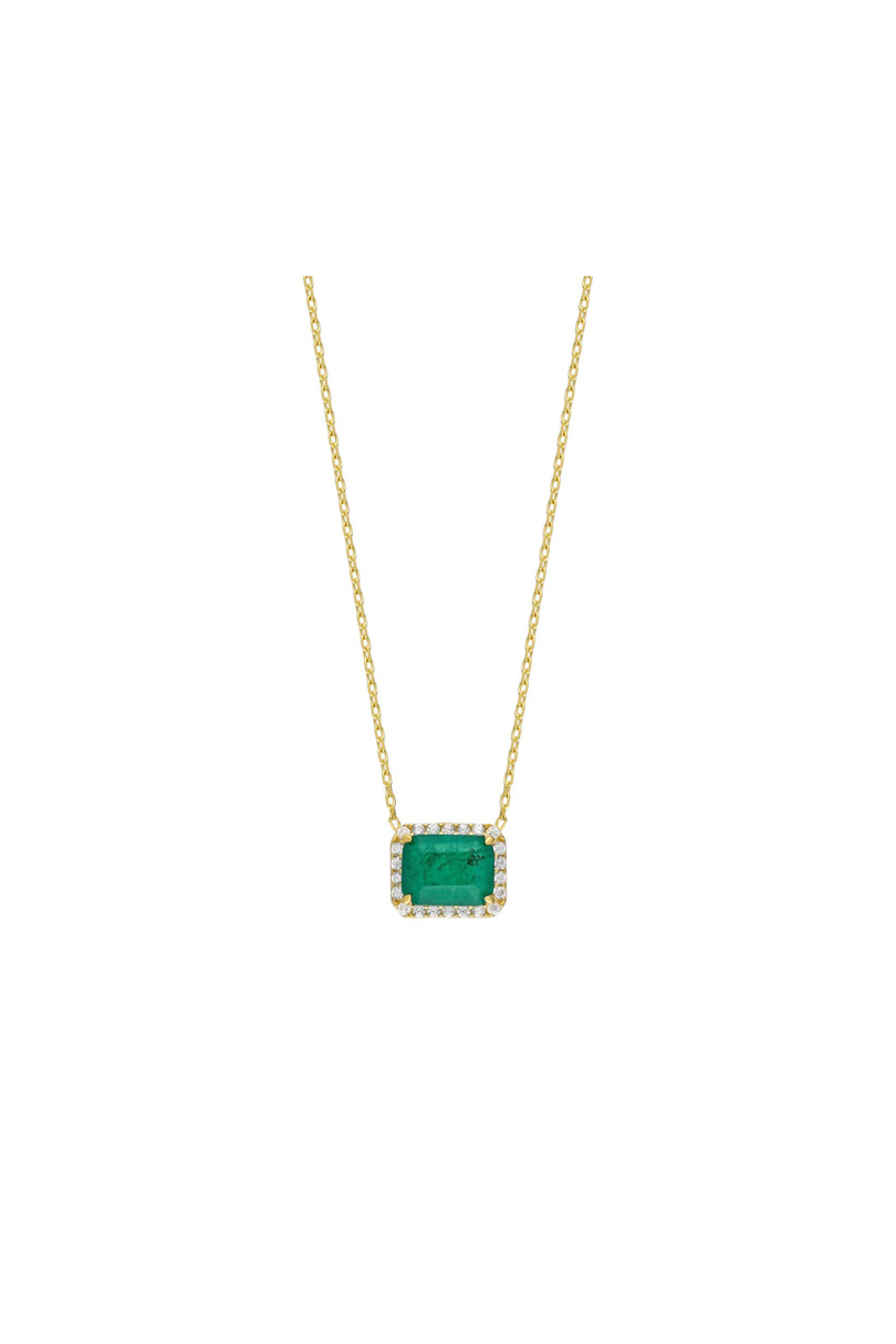 a necklace with a green stone in it